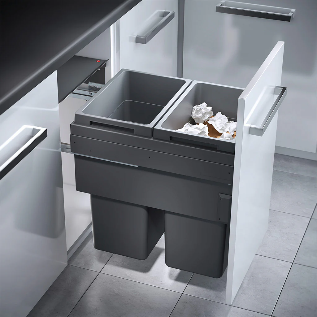 Pull-out waste bin system inside kitchen base cabinet